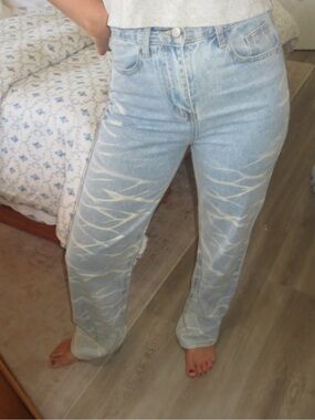 The Kript Light Wash Straight Leg Jeans with White Wave Accent